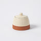 Grove Canister crafted from terracotta in a soft oatmeal finish